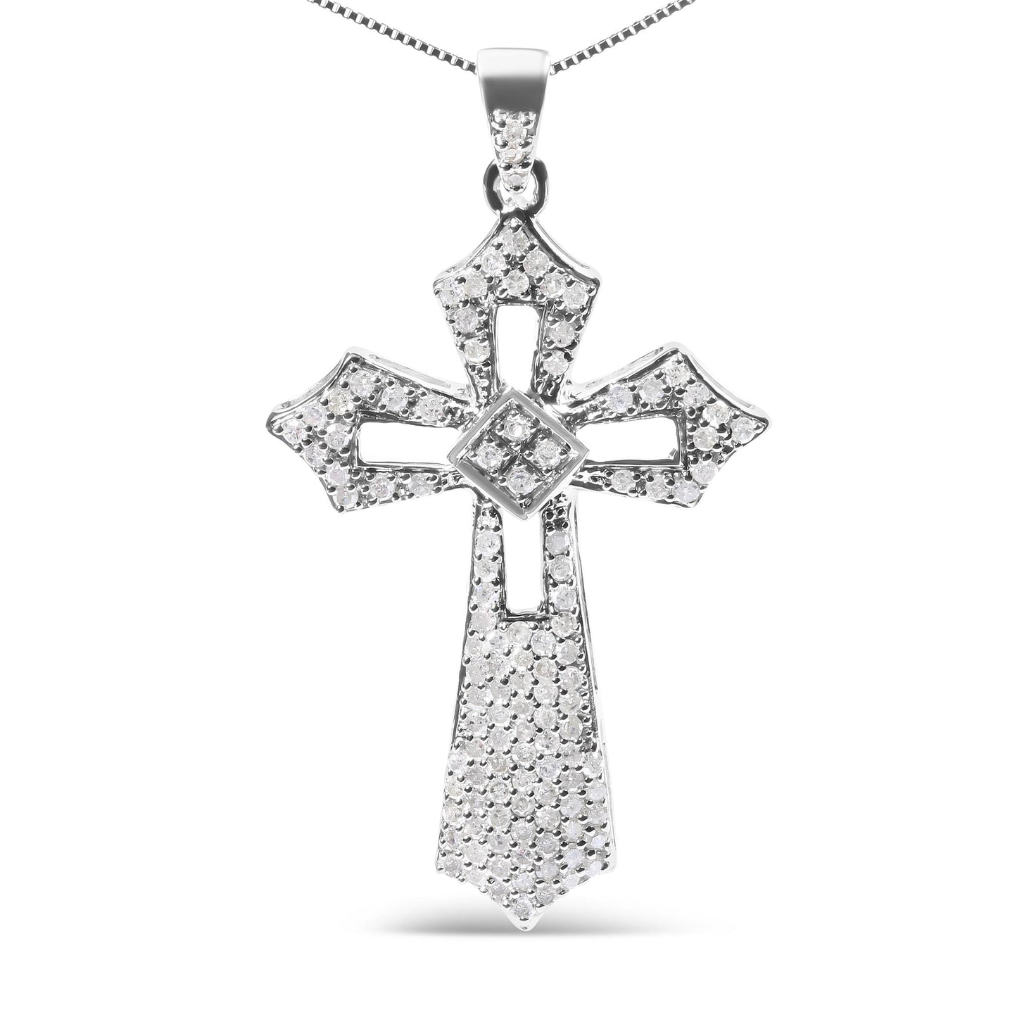 Front-facing shot of a white metal cross-shaped necklace pendant adorned with multiple round white gemstones in prong settings.