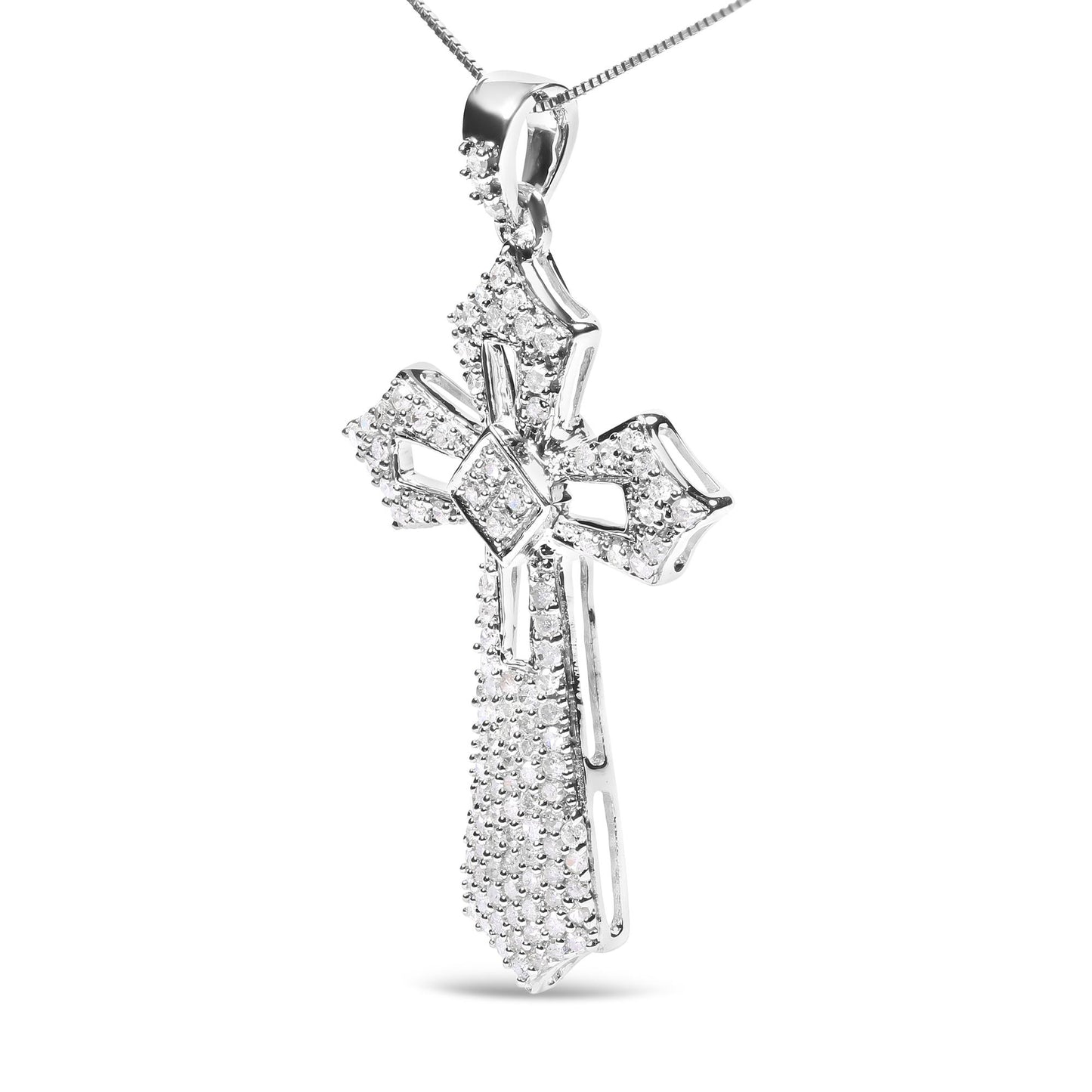 Close-up front-facing shot of a white metal cross-shaped necklace pendant adorned with round white gemstones in prong settings.