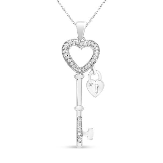Front-facing view of a white metal key-shaped necklace pendant with a heart-shaped top encrusted with round white gemstones in prong settings and a small heart-shaped padlock charm attached.