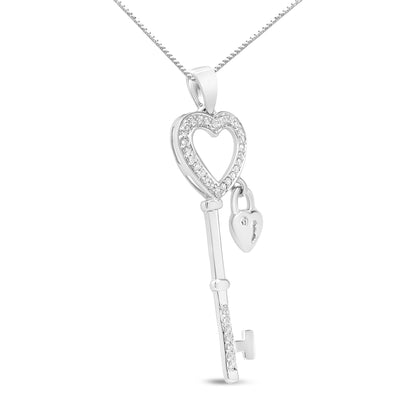 Front angled view of a white metal necklace pendant shaped like a key with a heart outline at the top set with round white gemstones, featuring a small heart-shaped lock charm hanging from the key.