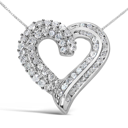 Close-up front view of a white metal heart-shaped necklace pendant with two rows of round white gemstones in prong settings on one side and two rows of round white gemstones in channel settings on the other side.