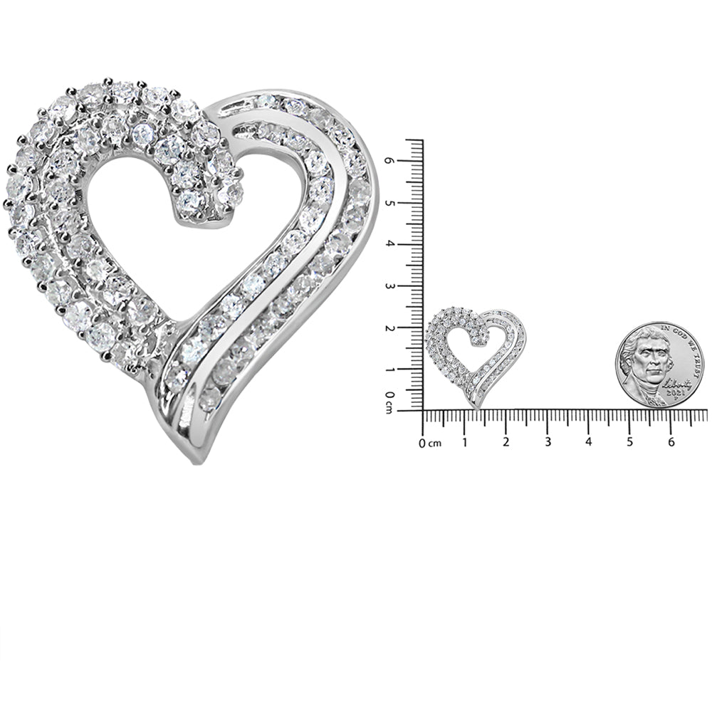 Front angled view of a white metal heart-shaped necklace pendant adorned with round white gemstones in prong and channel settings, displayed on a ruler for size reference.