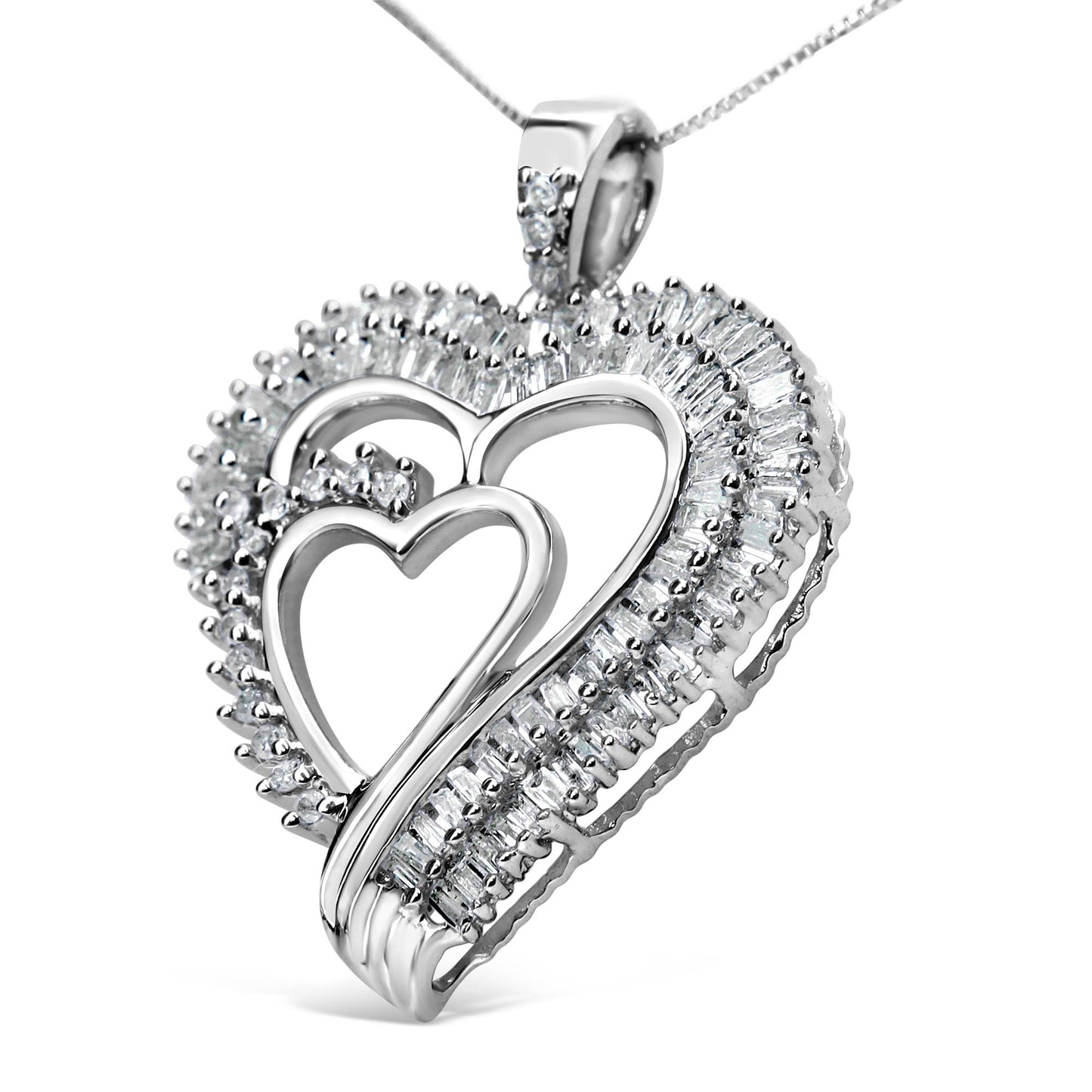 Close-up angled view of a white metal heart-shaped necklace pendant featuring two intertwined open hearts surrounded by white round prong-set gemstones and white baguette channel-set gemstones.