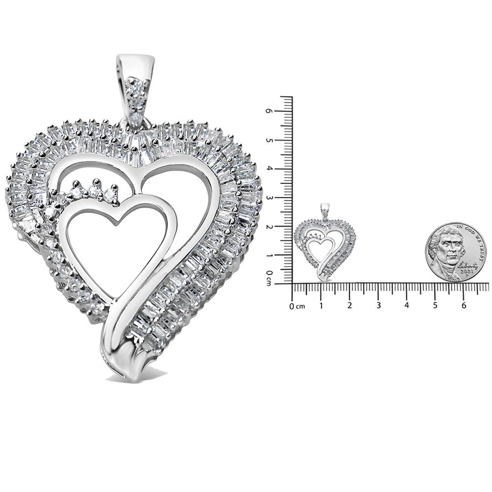 White metal heart-shaped necklace pendant with overlapping heart outlines, adorned with round prong-set white gemstones and baguette channel-set white gemstones, shown at a front angle next to a ruler and coin for size reference.