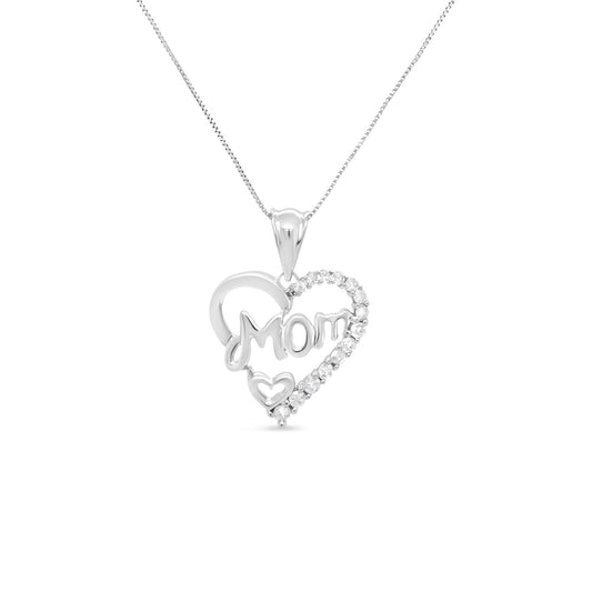 Front view of white metal heart-shaped necklace pendant with the word 'Mom' and small heart detail, adorned with multiple round white gemstones in prong settings.