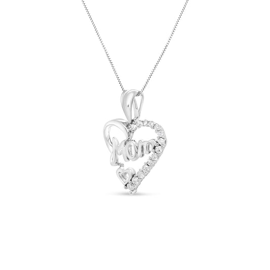 Front view of a white metal heart-shaped necklace pendant with the word 'Mom' inside and white gemstones outlining part of the heart.