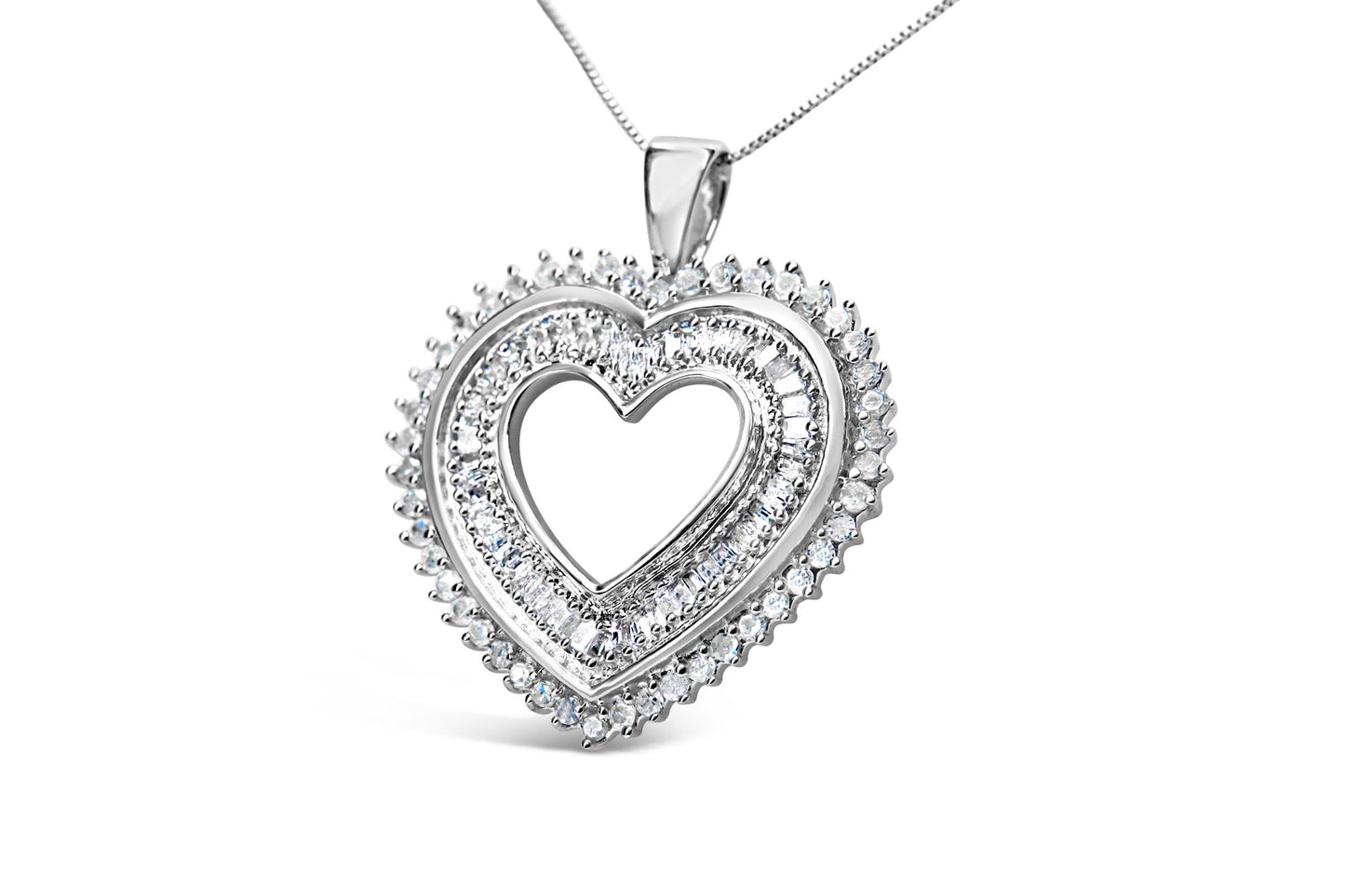Close-up front angle of a white metal heart-shaped necklace pendant with round prong-set white gemstones on the outer edge and baguette channel-set white gemstones on the inner part of the heart, suspended on a chain.