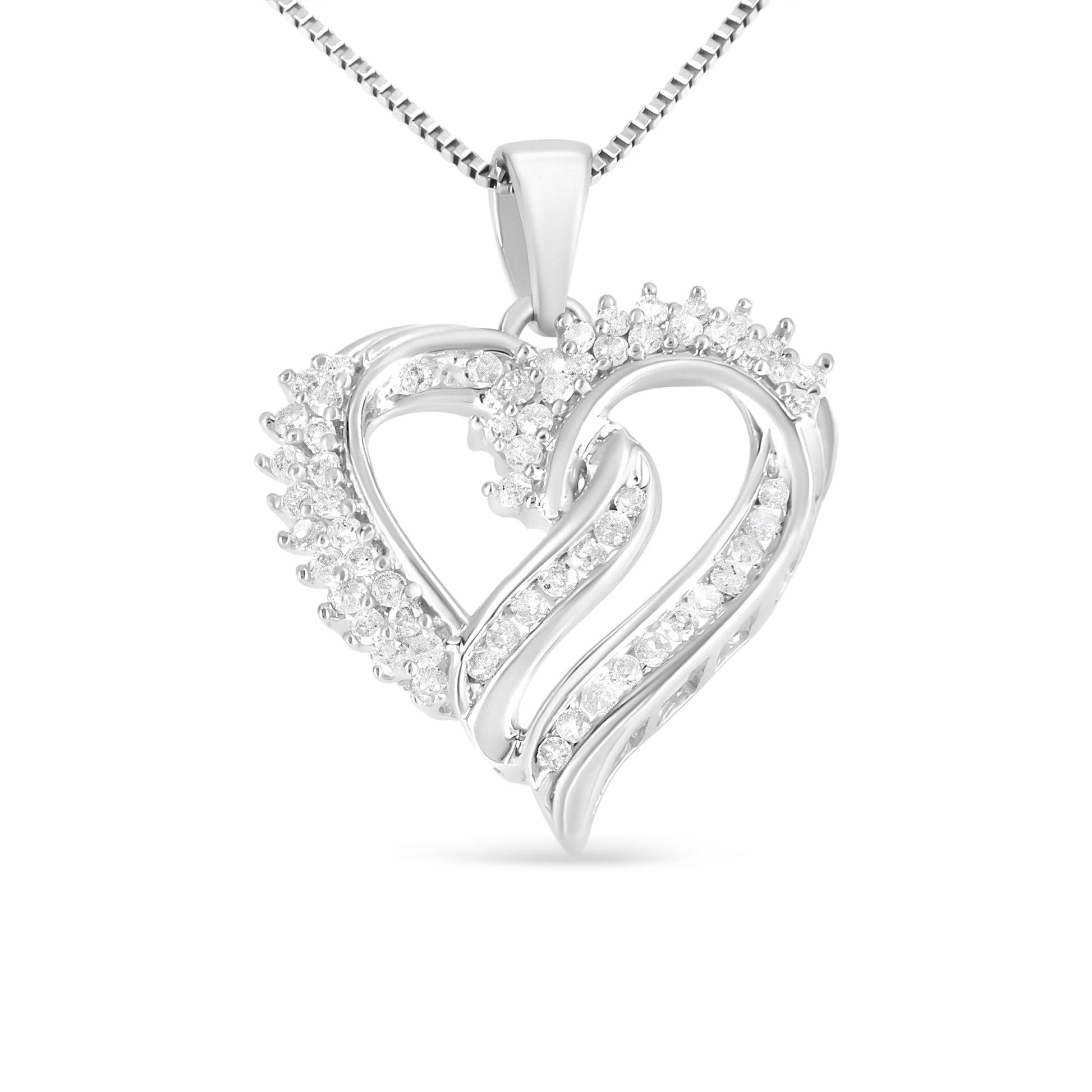 Front view of a white metal heart-shaped necklace pendant featuring round white gemstones in prong and channel settings on a chain.