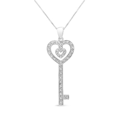 Front view of a white necklace with a key-shaped pendant featuring two heart-shaped loops and round white gemstones in prong settings.