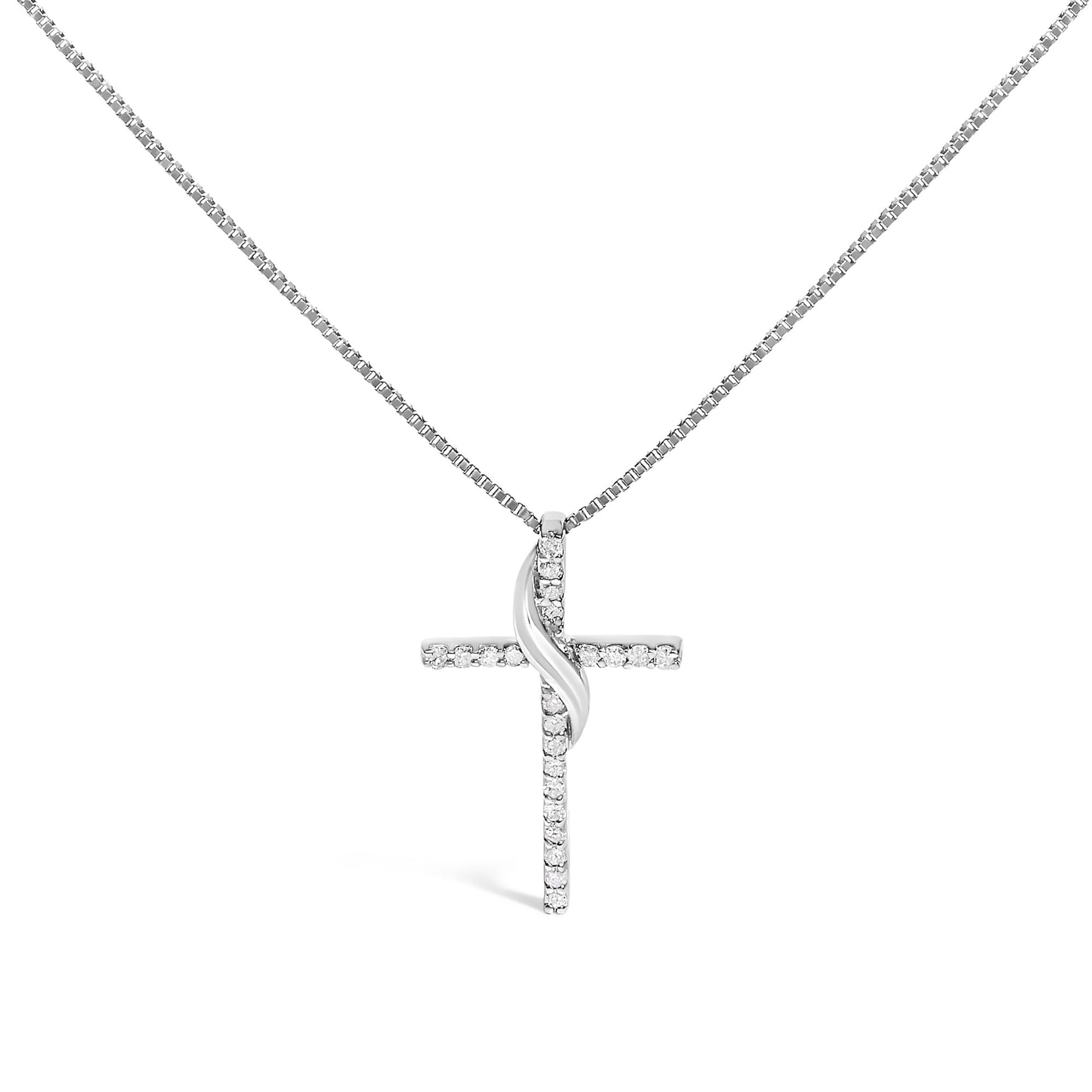 Front-facing white metal cross necklace with white round gemstones in prong settings, shown centered on a white background.