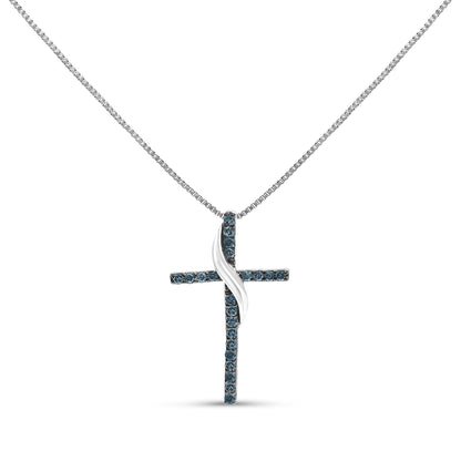 Front-facing shot of a white necklace with a cross pendant featuring round blue gemstones in prong settings and a twisted metal accent in the center.