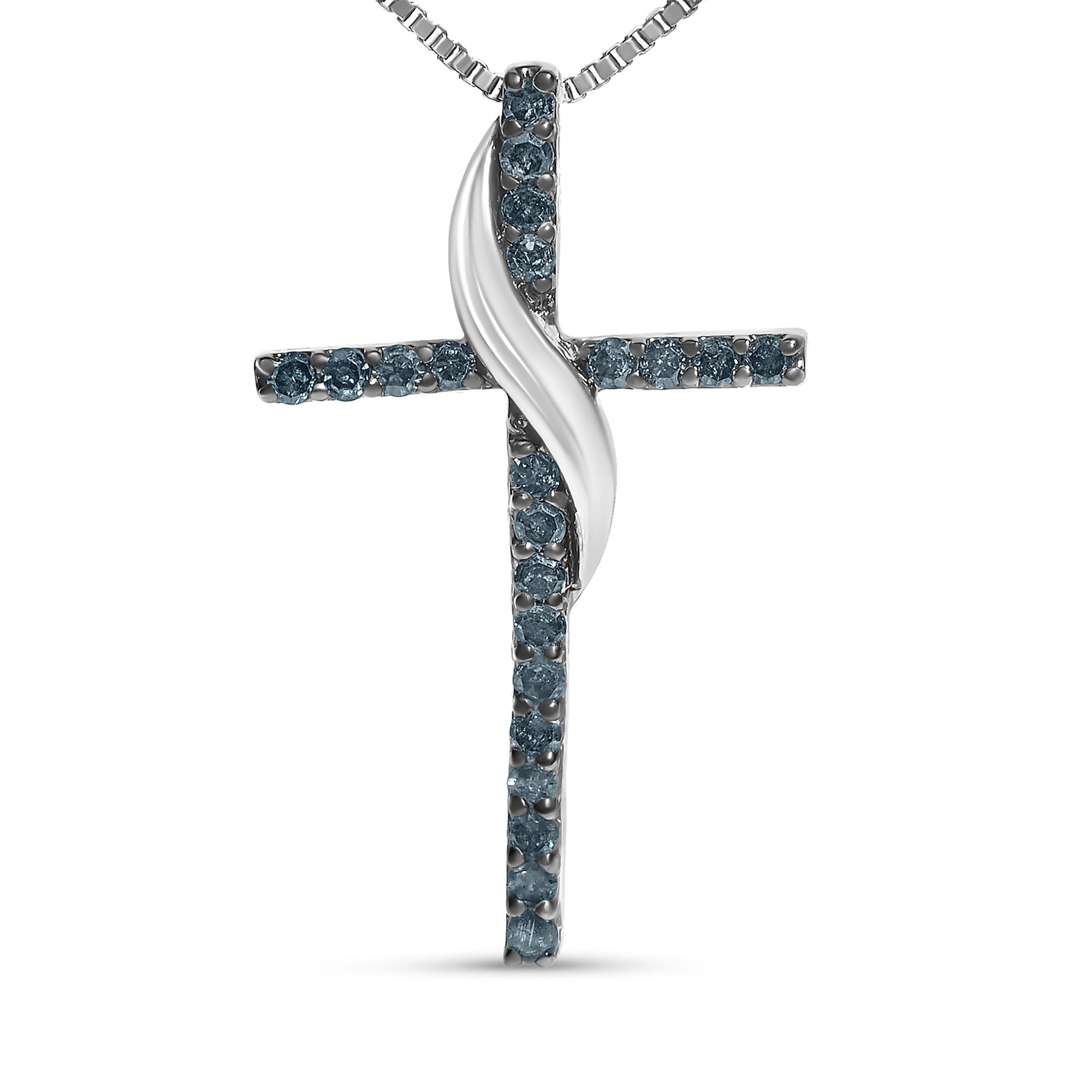 Front angle view of a white metal cross-shaped necklace pendant with blue round gemstones in prong settings along the cross, featuring a twisted metal detail in the center.