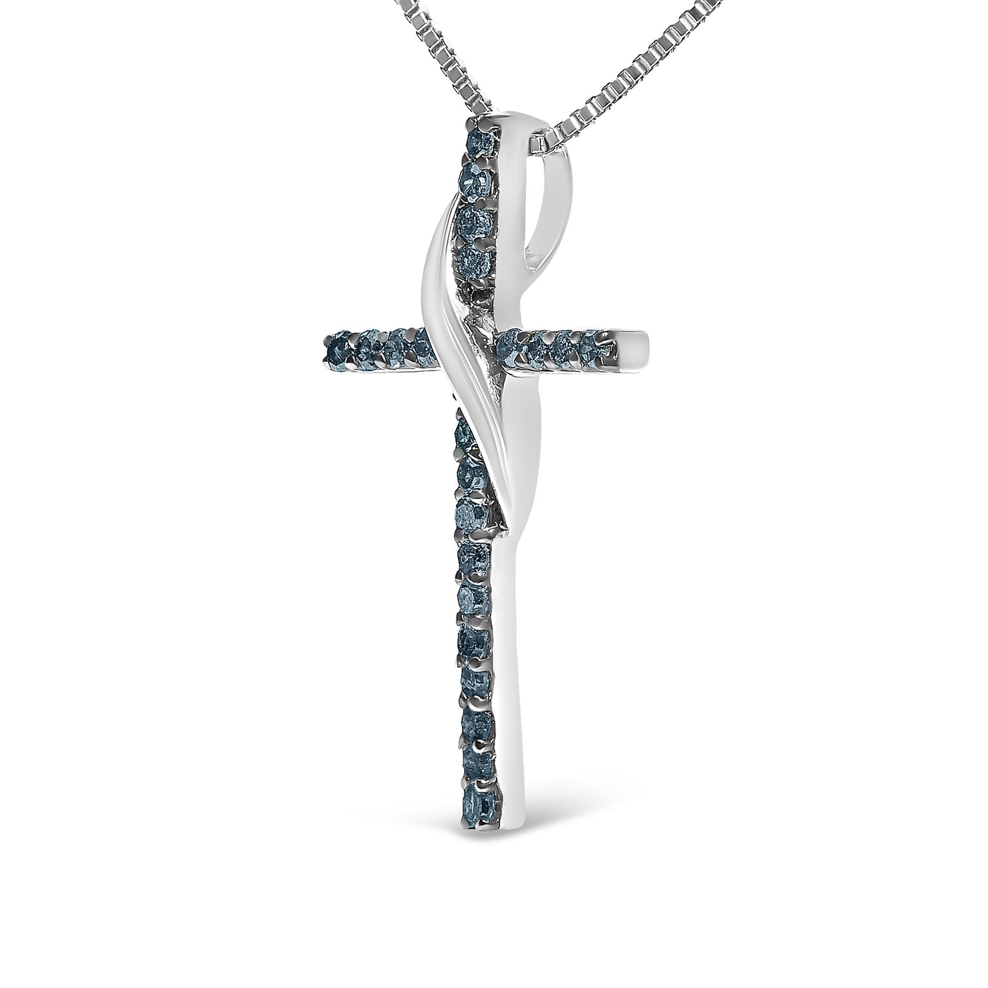 Front angled view of a white metal cross-shaped necklace pendant adorned with round prong-set blue gemstones, suspended on a matching chain.