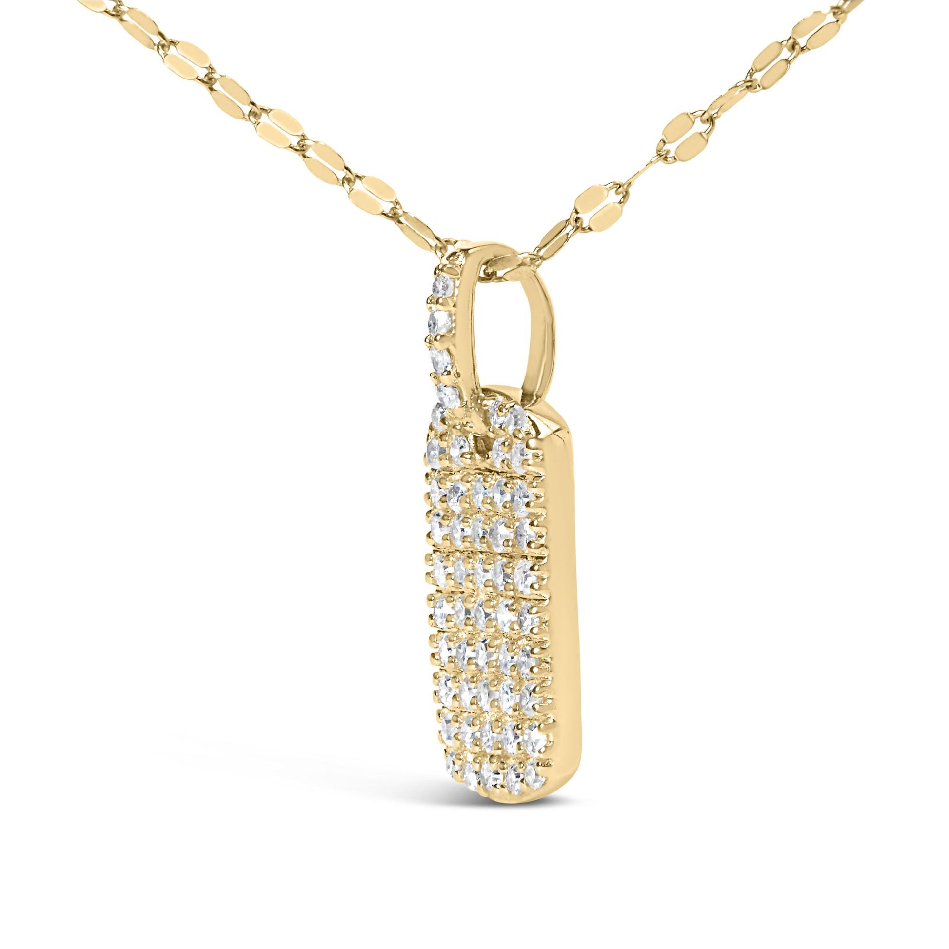 Yellow metal necklace with a vertical rectangular pendant covered in multiple white gemstones, shown in a close-up side angle.