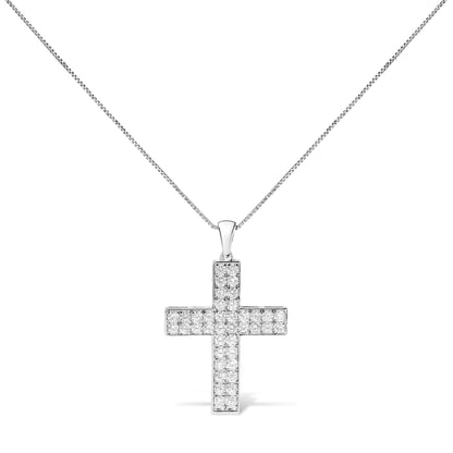 Front view of a white metal necklace with a cross-shaped pendant set with round white gemstones in prong settings.