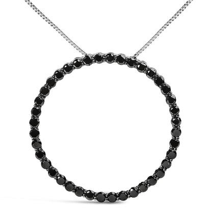 Close-up front view of a white metal circular necklace featuring round black gemstones in a shared prong setting.