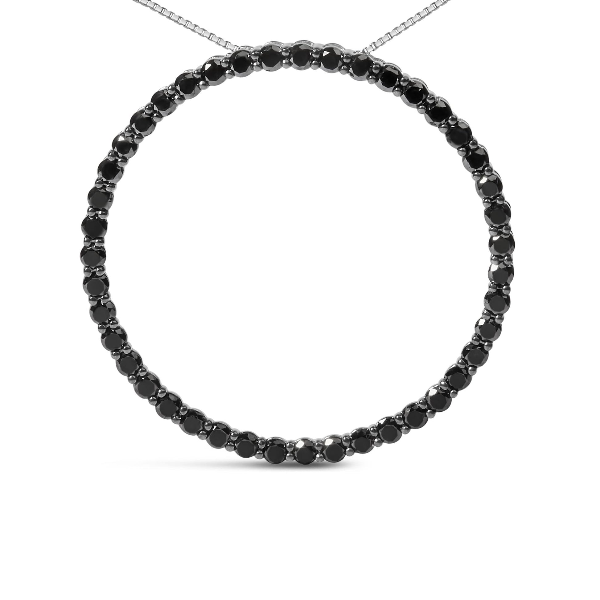 Front-facing shot of a white metal necklace featuring a circular pendant adorned with round black gemstones in a shared prong setting.