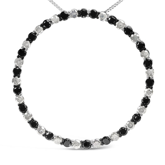 Front-facing close-up of a white metal necklace featuring alternating round black and white gemstones in prong settings.