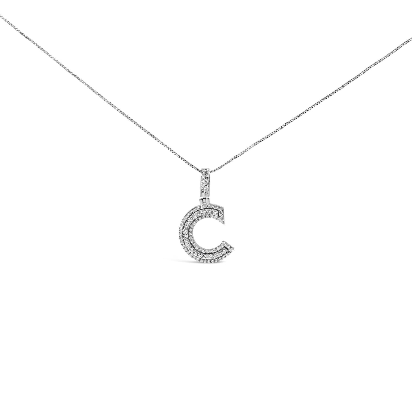 Front-facing shot of a white metal necklace with a letter C-shaped pendant encrusted with two rows of round white gemstones on the pendant and additional gemstones on the bail.
