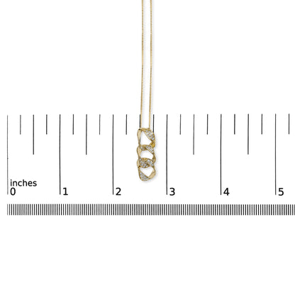 Yellow necklace with linked oval shapes accented by white gemstones, shown hanging vertically on a ruler for size reference, front view.