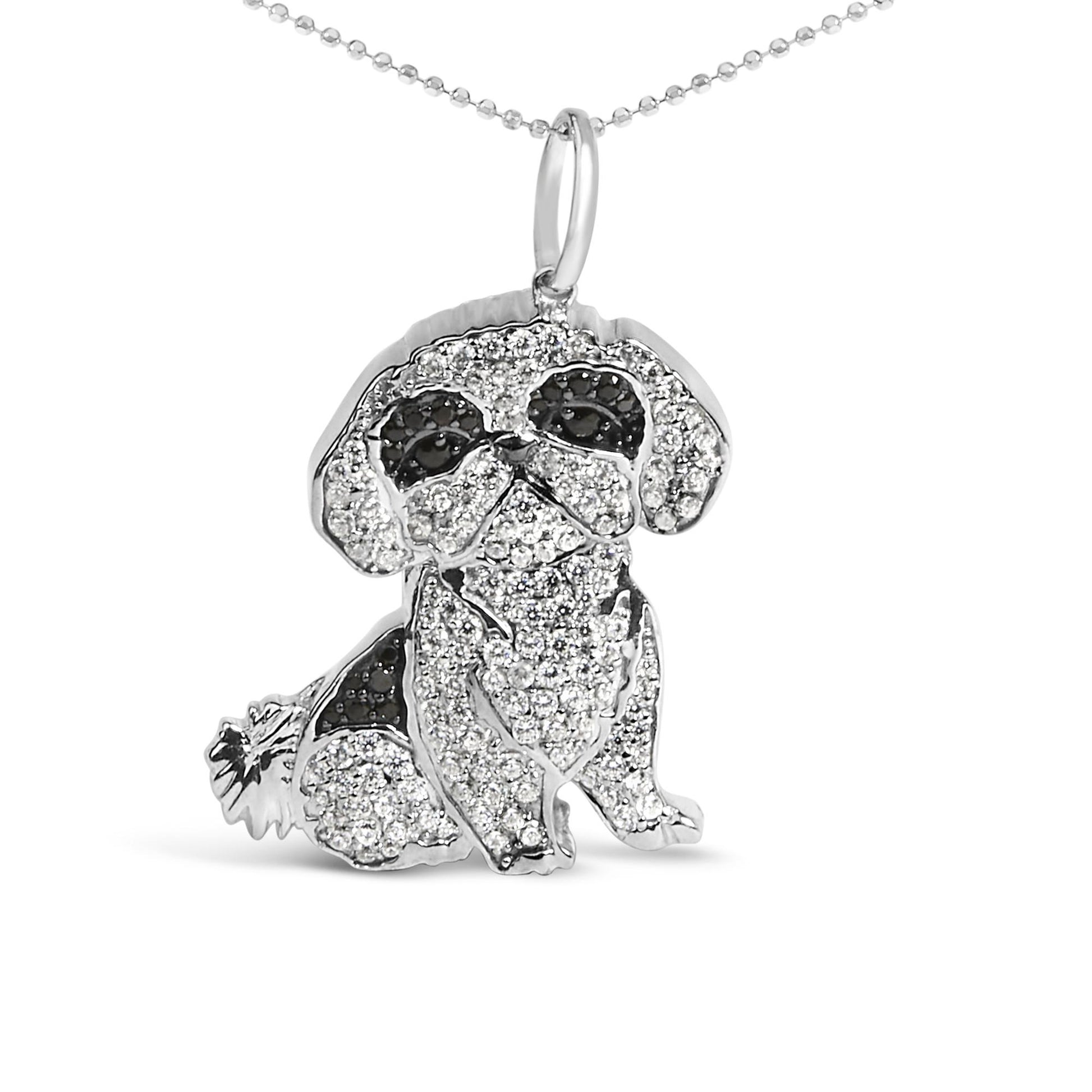White metal necklace pendant shaped like a sitting dog, adorned with round black and white gemstones in micro-pave setting, shown from a front angle.
