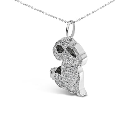 White metal necklace with a pendant shaped like a dog, detailed with micro-pave white and black round gemstones, shown in a close-up side angle.