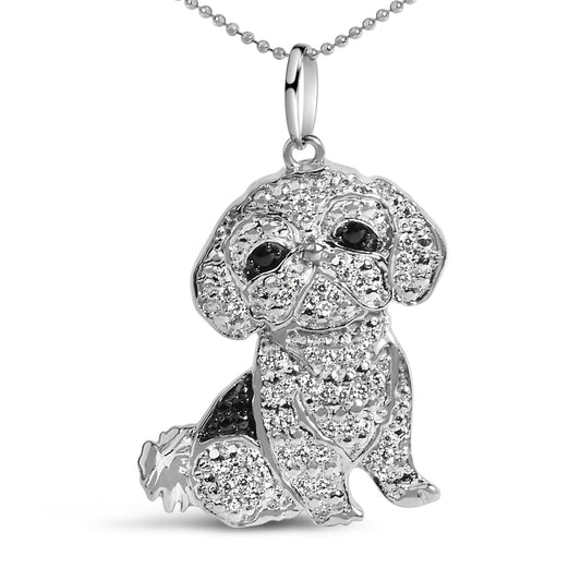 Close-up front view of a white metal necklace pendant shaped like a sitting dog, decorated with round white gemstones in a micro-pave setting and accented with round black gemstones for the eyes and patches.