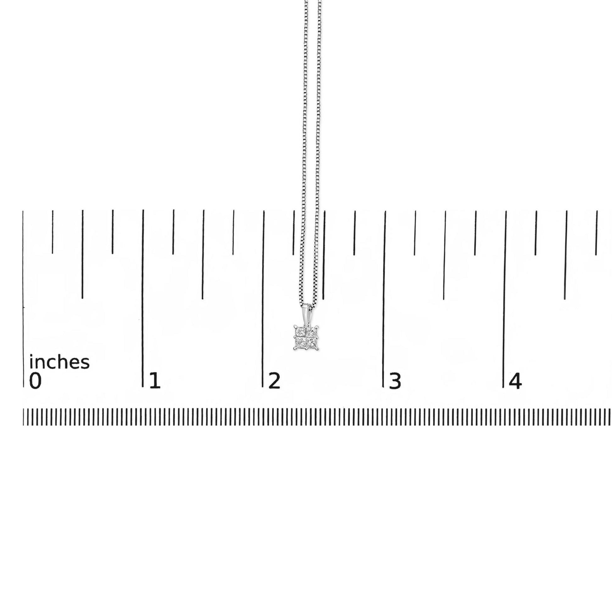 White necklace with a princess-shaped cluster of white gemstones in an invisible setting, shown hanging vertically on a scale, front view.