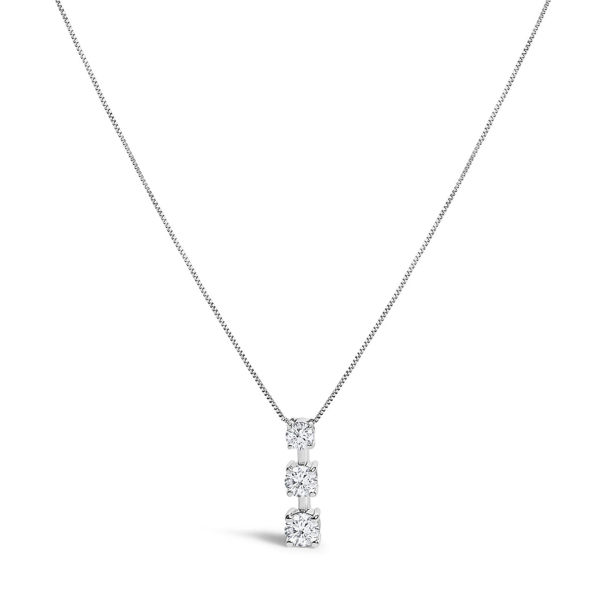 Front view of a white metal necklace with a fine chain and a vertical pendant featuring three white round gemstones in prong and miracle settings, shown on a white background.