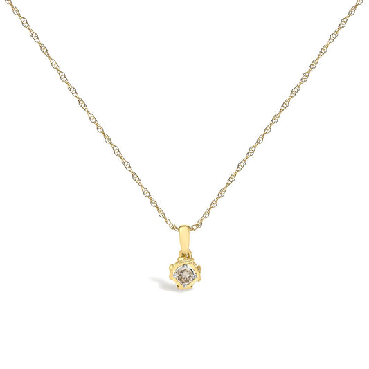 Yellow metal necklace with a small pendant featuring a round white gemstone in a prong setting, shown in a front-facing angle on a white background.