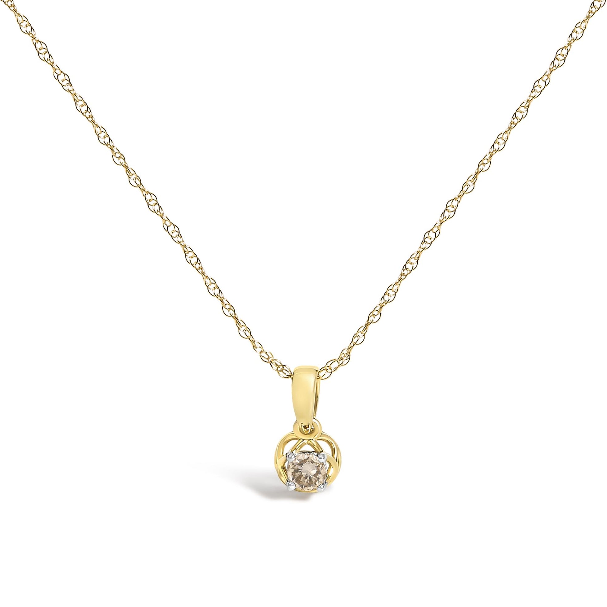 Close-up front view of a yellow metal necklace with a pendant featuring a round white gemstone in a prong setting.