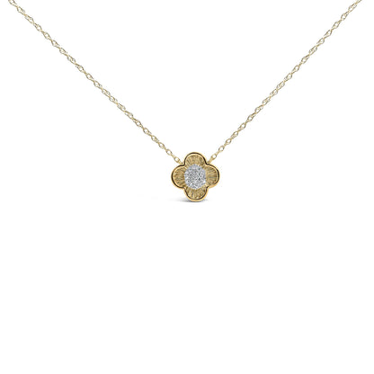 Close-up front view of a yellow metal necklace with a flower-shaped pendant featuring clustered white round gemstones in the center, shown on a white background.