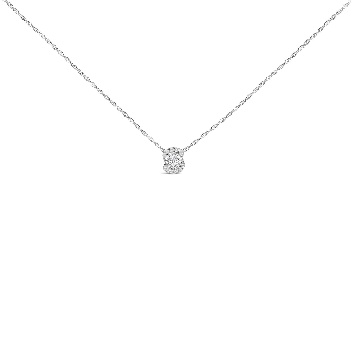 White necklace with a central cluster of round white gemstones in prong settings, shown in a front-facing close-up.