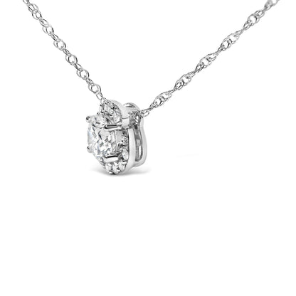 Close-up angled view of a white necklace with a round center white gemstone surrounded by smaller round white gemstones in a prong setting.