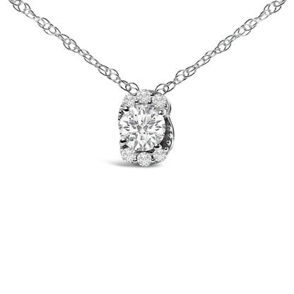 Close-up front view of a white metal necklace with a pendant featuring one large round white gemstone surrounded by six smaller round white gemstones in prong settings.