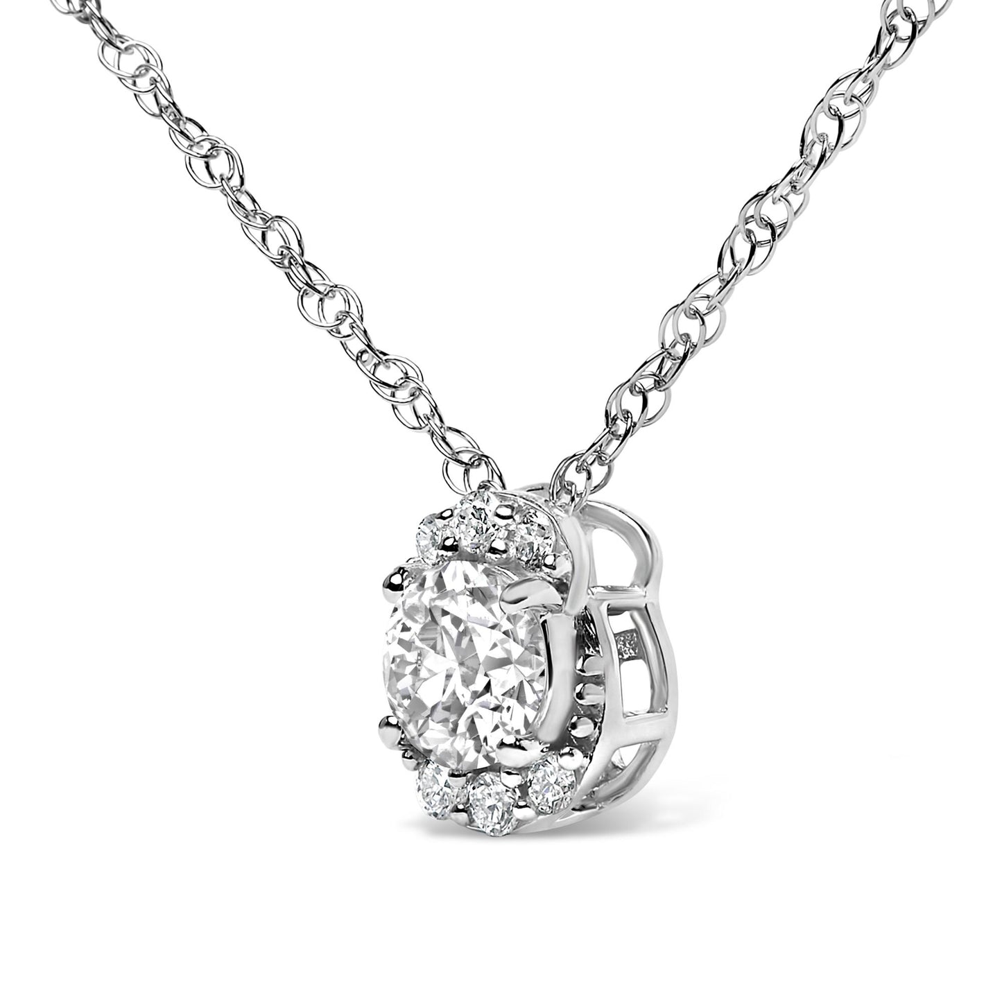 Close-up front angle of a white metal necklace featuring a pendant with one large round white gemstone surrounded by smaller round white gemstones in prong settings.
