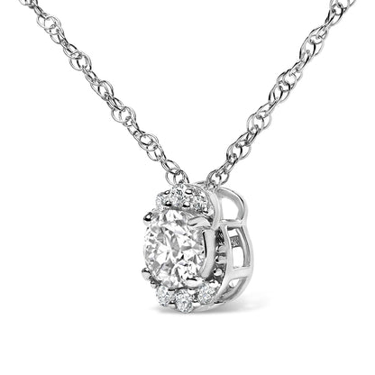 Close-up front angle of a white metal necklace featuring a pendant with one large round white gemstone surrounded by smaller round white gemstones in prong settings.
