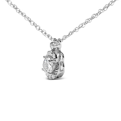Close-up side angle of a white metal necklace featuring a round pendant with prong-set white gemstones.