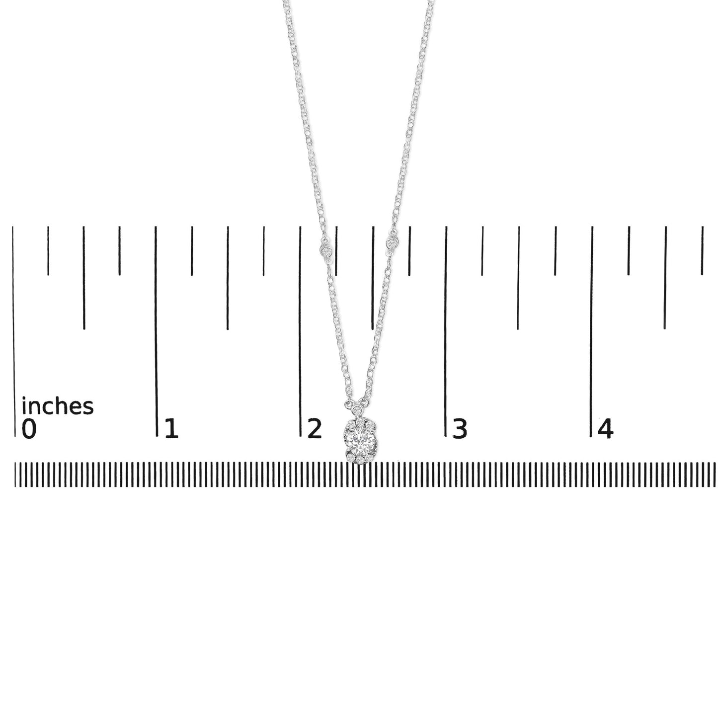 White necklace with a pendant featuring one large white gemstone surrounded by smaller white gemstones, shown on a scale with the image taken from a front angle.