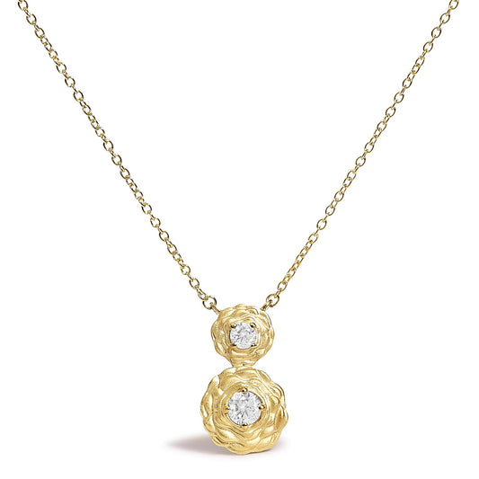 Yellow necklace with two round white gemstones in four-prong settings, designed like textured floral shapes, shown in a front-facing close-up.