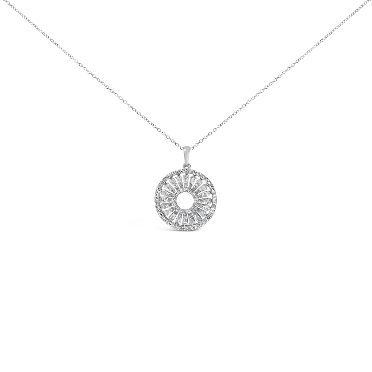 White metal necklace shown from the front with a circular pendant featuring concentric rows of round and baguette shaped white gemstones in prong settings, photographed on a white background.