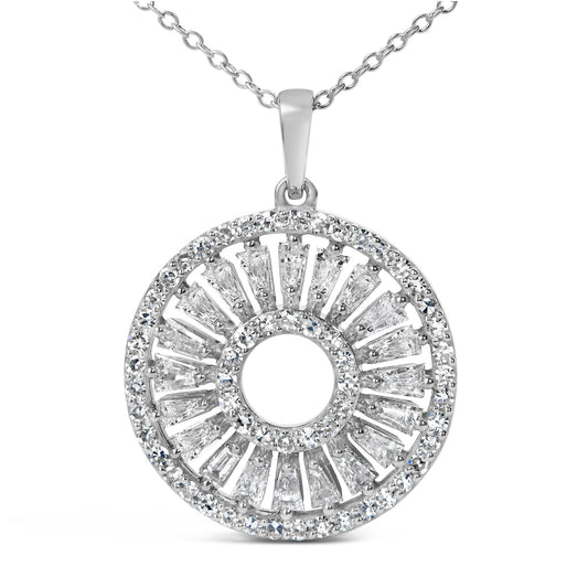 Close-up front angle of a white metal circular pendant necklace featuring baguette and round white gemstones in prong settings with an open center, shown on a white background.