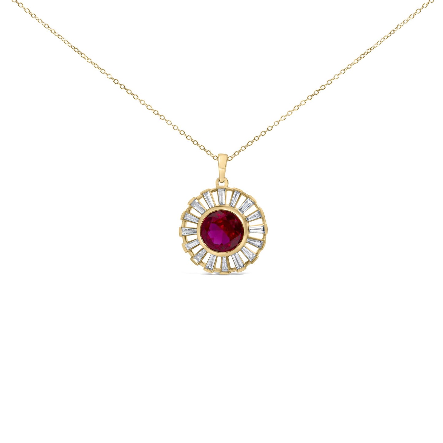 Close-up front view of a yellow metal necklace with a circular pendant featuring a central round red gemstone surrounded by baguette-shaped white gemstones in a radiating channel setting.