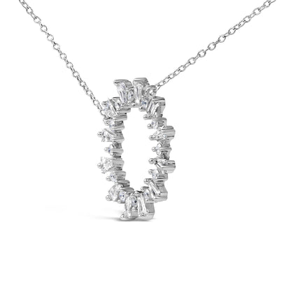 Close-up front angle of a white necklace with a circular pendant featuring alternating baguette and round white gemstones in prong settings, shown on a white background.