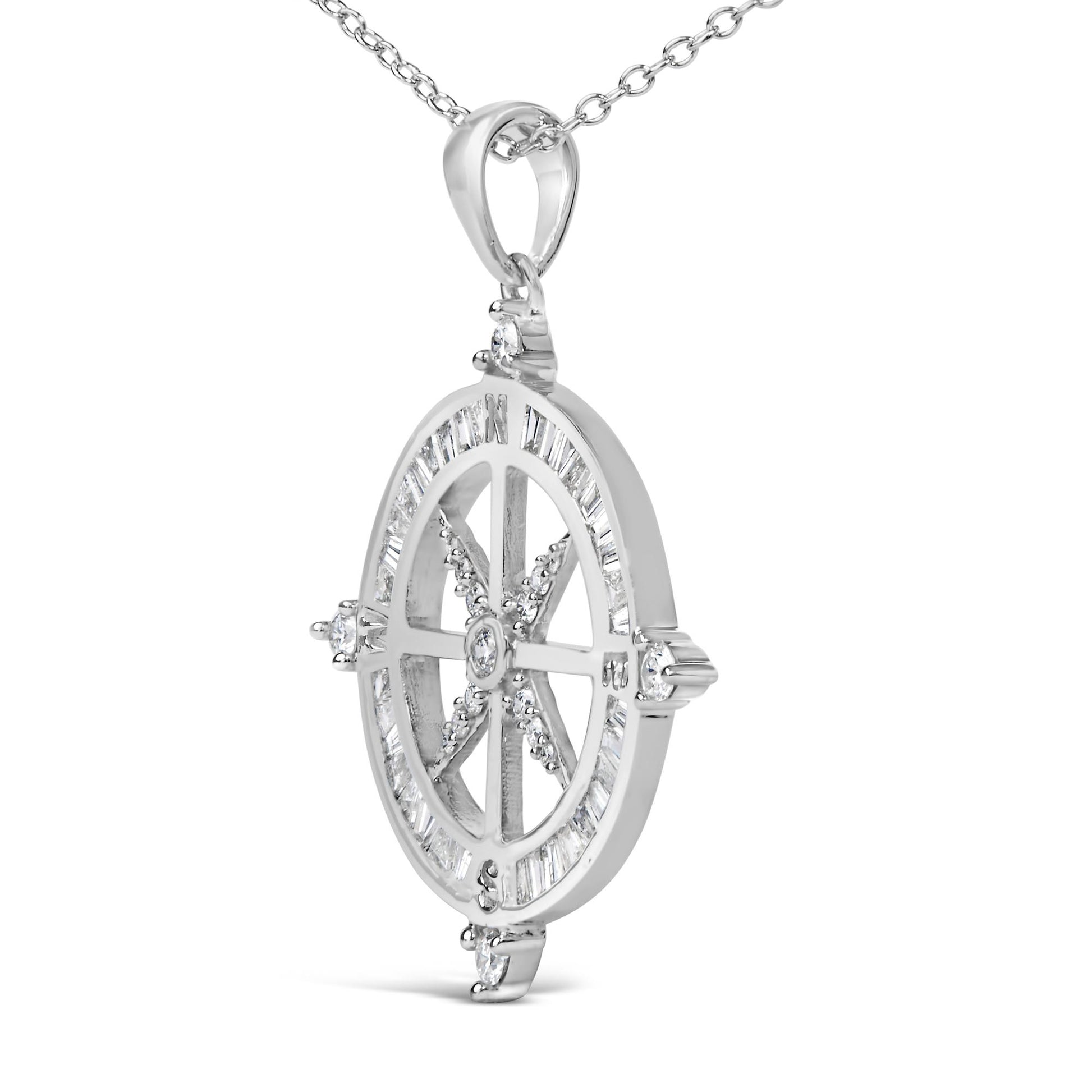 Close-up angled view of a white metal necklace pendant featuring a circular design. The pendant is adorned with white gemstones in baguette shape with channel setting around the outer edge and round shape with prong setting within the interior and at the four cardinal points. The pendant hangs from a white metal chain.