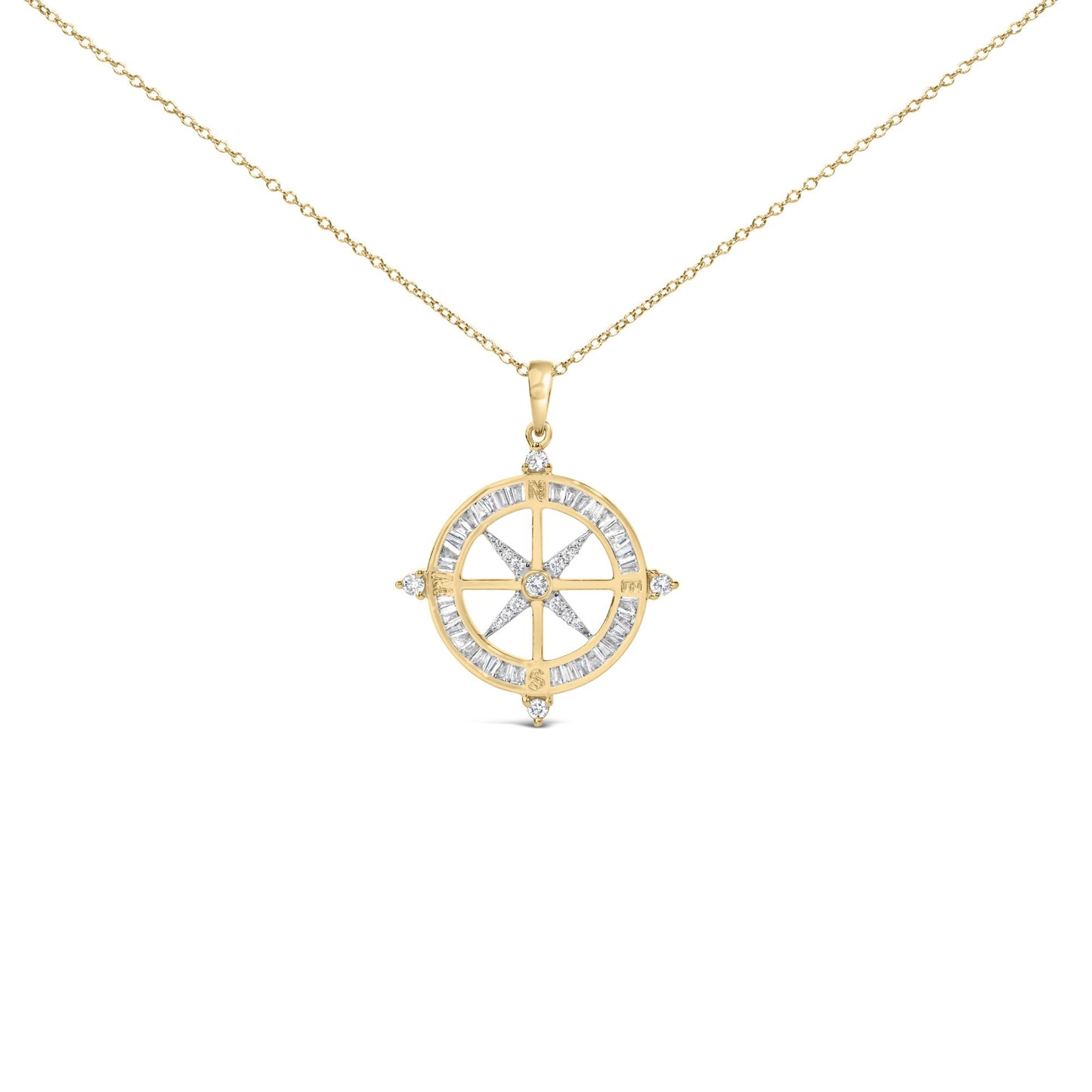 Close-up front view of a yellow necklace with a round pendant featuring a compass design. The pendant is adorned with white baguette-shaped gemstones in a channel setting around the circle and accented with round white gemstones in a prong setting at the cardinal points and center.