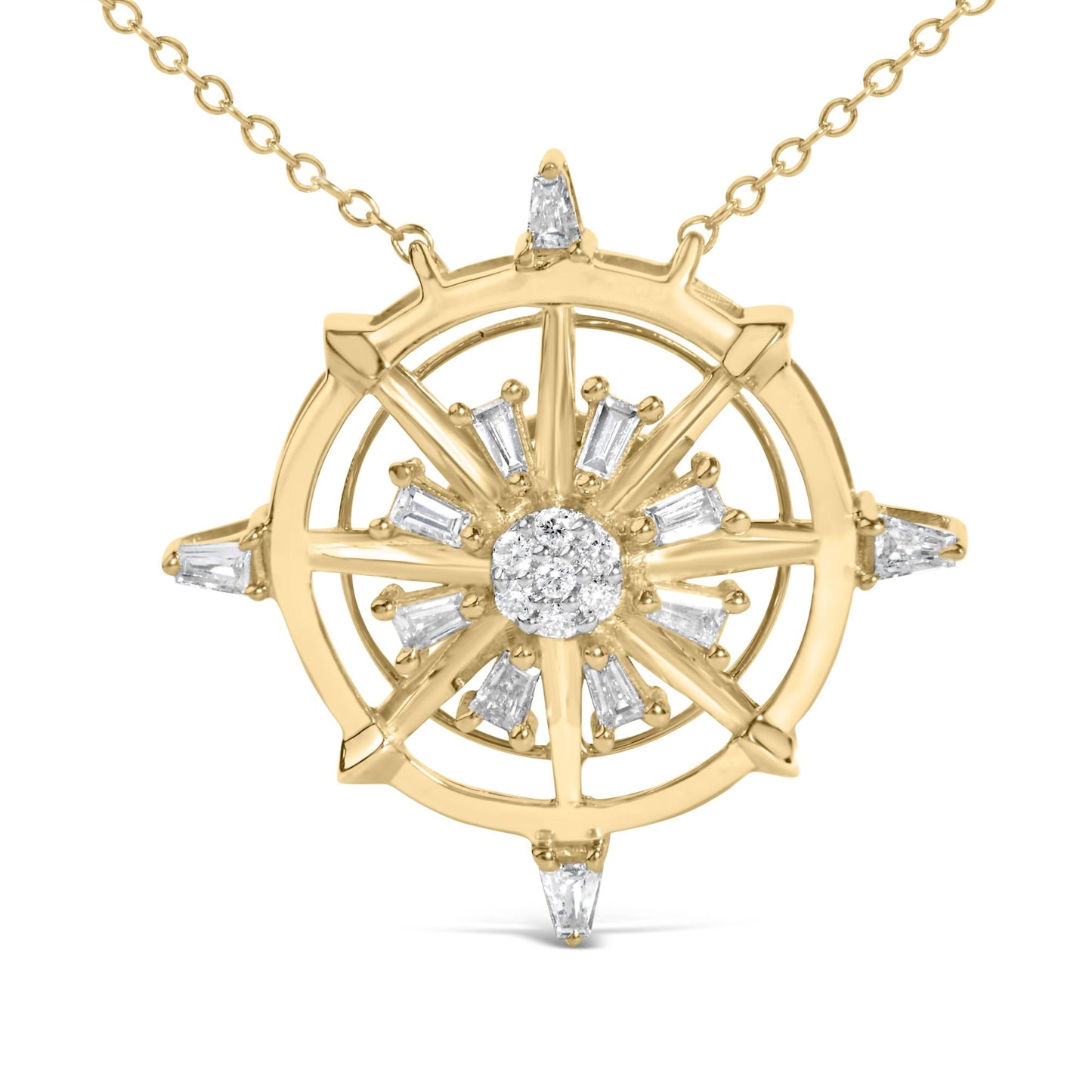 Close-up front angle of a yellow metal necklace pendant shaped like a compass with round and baguette white gemstones in prong settings, shown on a white background.