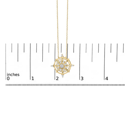 Close-up front view of a yellow necklace pendant with a circular sunburst design featuring white round and baguette-shaped gemstones, shown on a scale.