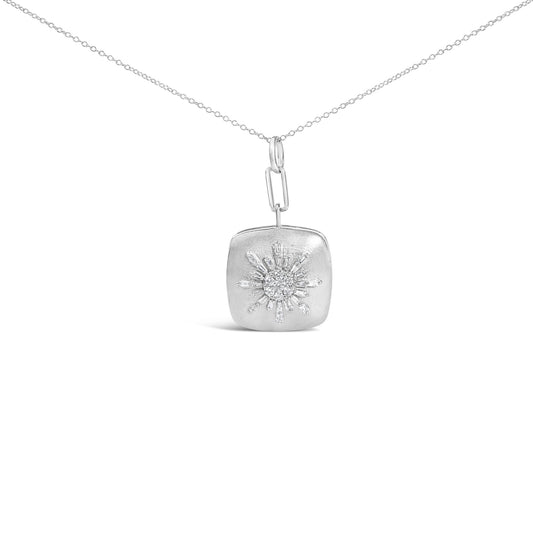 Close-up front view of a white necklace chain with a pendant featuring a sunburst design of baguette and round white gemstones.