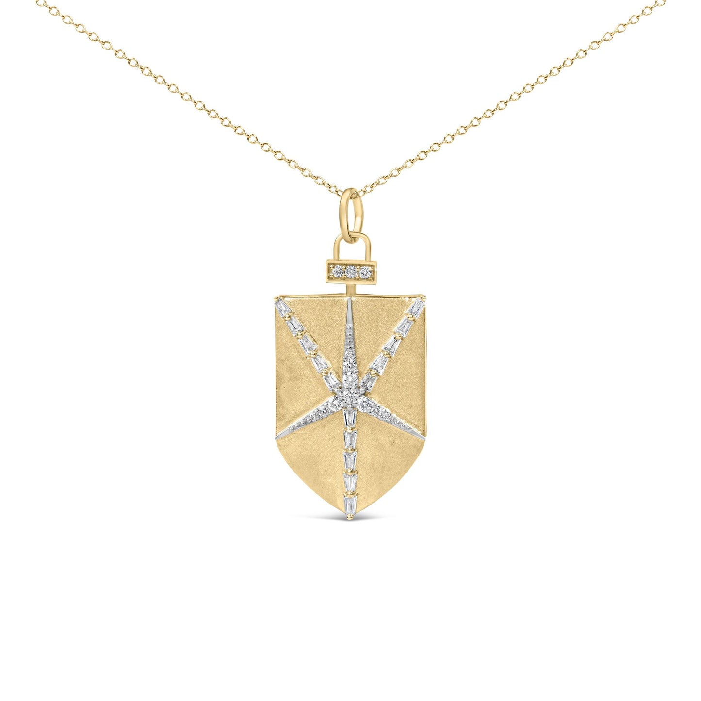 Close-up front view of a yellow metal necklace with a rectangular pendant featuring a starburst design made of white round and baguette-shaped gemstones, shown on a white background.